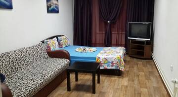 Фото номера Двухместный номер с 2 отдельными кроватями и дополнительной кроватью Апартаменты на Екатерининской 122 г. Пермь 11