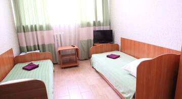Фото номера Двухместный номер с 2 отдельными кроватями Гостевой дом Inn Ekonom г. Пермь 2